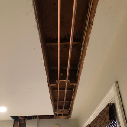 overhead drain pipes in ceiling